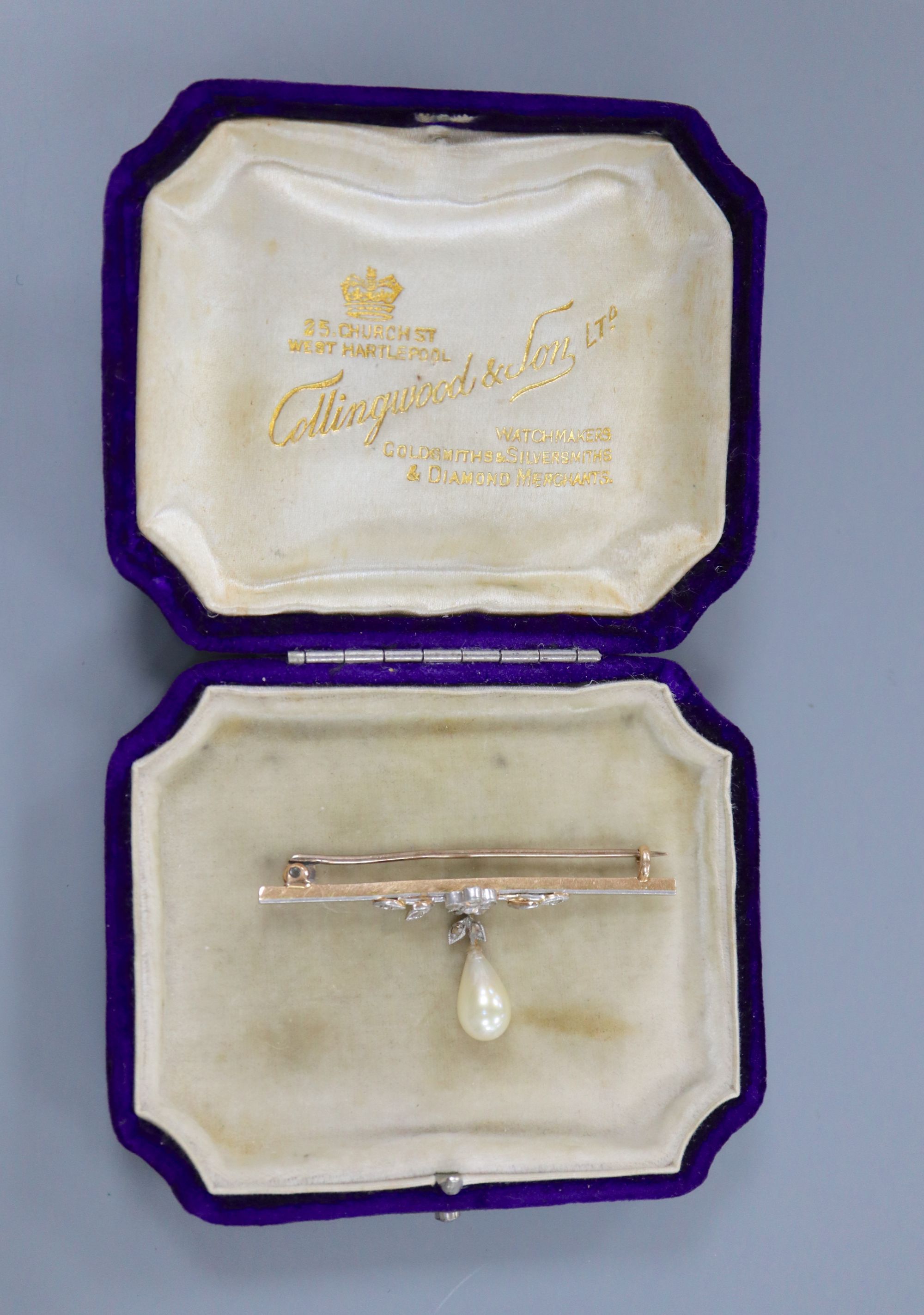 A 1920s yellow metal, rose cut diamond and simulated pearl drop set bar brooch, 52mm, gross 3.6 grams.